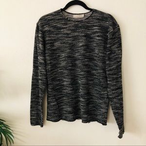 Entity crewneck raw edge sweater.